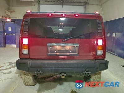 Zdjęcie 6 z 14 samochodu: 2003 HUMMER H2 VIN:5GRGN23U23H144695 - miniatura