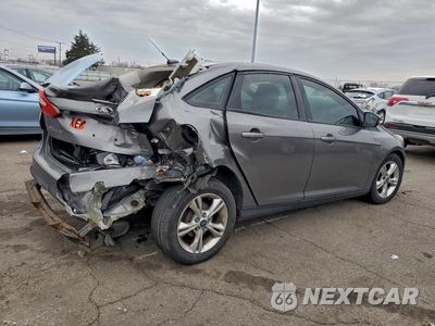 Trzecie zdjęcie samochodu z tyłu: 2014 FORD FOCUS SE VIN:1FADP3F22EL165986 - miniatura