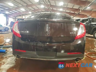 Zdjęcie 6 z 12 samochodu: 2014 LINCOLN MKS VIN:1LNHL9DK1EG600661 - miniatura