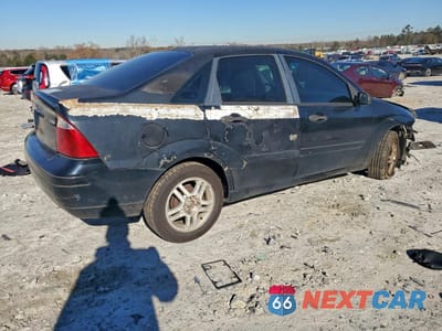 Trzecie zdjęcie samochodu z tyłu: 2005 FORD FOCUS ZX4 VIN:1FAFP34N25W213457 - miniatura