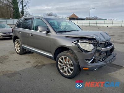 Czwarte zdjęcie samochodu z boku: 2009 VOLKSWAGEN TOUAREG 2 V6 VIN:WVGBE77L29D002191 - miniatura