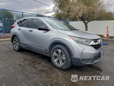 Czwarte zdjęcie samochodu z boku: 2017 HONDA CR-V LX VIN:5J6RW5H37HL004021 - miniatura