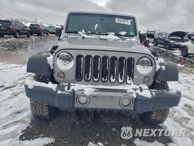 Piąte zdjęcie samochodu w środku: 2015 JEEP WRANGLER UNLIMITED SPORT VIN:1C4BJWDG5FL564721 - miniatura