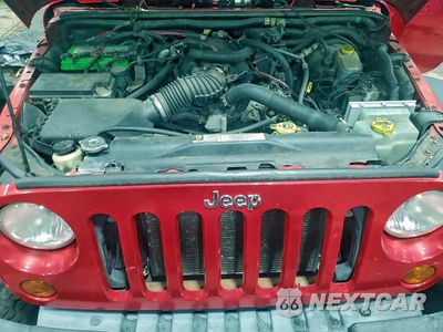 Zdjęcie 11 z 11 samochodu: 2007 JEEP WRANGLER X VIN:1J4GA39197L113814 - miniatura