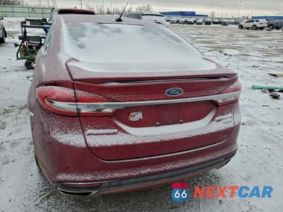 Zdjęcie 6 z 12 samochodu: 2017 FORD FUSION TITANIUM VIN:3FA6P0K97HR118288 - miniatura