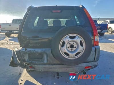 Zdjęcie 6 z 14 samochodu: 2002 HONDA CR-V LX VIN:JHLRD68412C016959 - miniatura