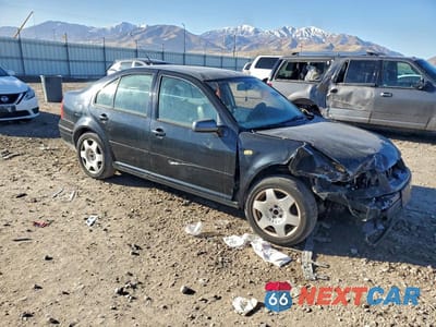 Czwarte zdjęcie samochodu z boku: 2000 VOLKSWAGEN JETTA GLS VIN:3VWSC29M9YM014289 - miniatura