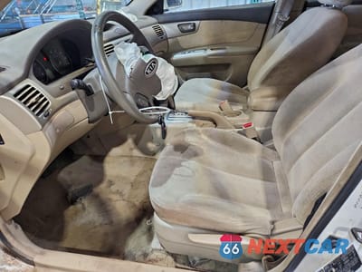 Zdjęcie 7 z 12 samochodu: 2006 KIA OPTIMA LX VIN:KNAGE123165023468 - miniatura