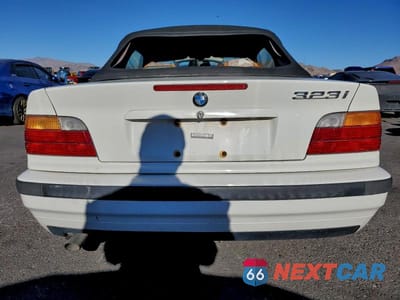 Zdjęcie 6 z 11 samochodu: 1998 BMW 323 IC AUTOMATIC VIN:WBABJ8321WEM21364 - miniatura