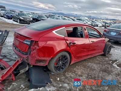 Trzecie zdjęcie samochodu z tyłu: 2018 TESLA MODEL 3 VIN:5YJ3E1EB7JF072850 - miniatura