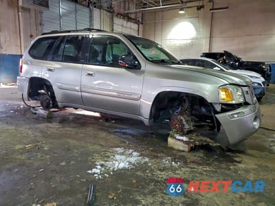 Czwarte zdjęcie samochodu z boku: 2002 GMC ENVOY VIN:1GKDT13S622207354 - miniatura
