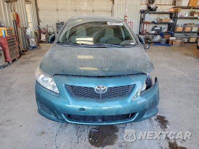 Piąte zdjęcie samochodu w środku: 2010 TOYOTA COROLLA BASE VIN:JTDBU4EE7A9122716 - miniatura