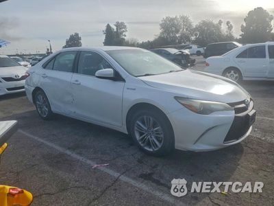 Czwarte zdjęcie samochodu z boku: 2016 TOYOTA CAMRY HYBRID VIN:4T1BD1FK9GU181979 - miniatura