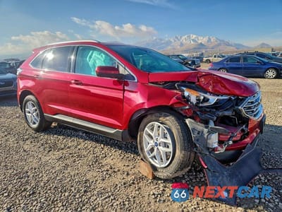 Czwarte zdjęcie samochodu z boku: 2021 FORD EDGE VIN:2FMPK4J9XMBA48263 - miniatura
