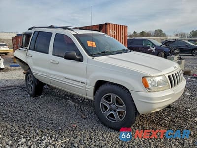 Czwarte zdjęcie samochodu z boku: 2000 JEEP GRAND CHEROKEE LIMITED VIN:1J4GW58N6YC227501 - miniatura