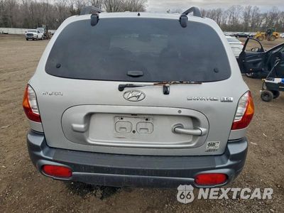 Zdjęcie 6 z 12 samochodu: 2004 HYUNDAI SANTA FE GLS VIN:KM8SC73E34U641153 - miniatura