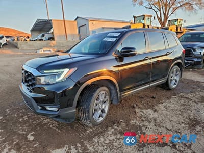 2023 HONDA PASSPORT EXL 5FNYF8H5XPB034054 - główne zdjęcie licytacji z USA - miniatura