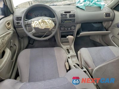 Zdjęcie 8 z 13 samochodu: 2000 TOYOTA COROLLA VE VIN:1NXBR12E0YZ375948 - miniatura