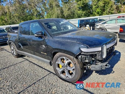 Czwarte zdjęcie samochodu z boku: 2022 RIVIAN R1T ADVENTURE VIN:7FCTGAAAXNN015177 - miniatura