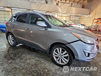 Czwarte zdjęcie samochodu z boku: 2012 HYUNDAI TUCSON GLS VIN:KM8JUCAC8CU445307 - miniatura