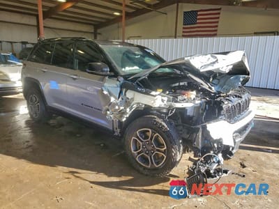 Czwarte zdjęcie samochodu z boku: 2022 JEEP GRAND CHEROKEE TRAILHAWK 4XE VIN:1C4RJYC65N8747850 - miniatura