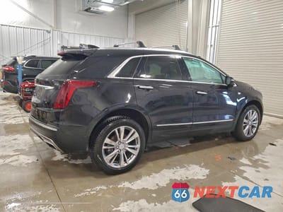 Trzecie zdjęcie samochodu z tyłu: 2023 CADILLAC XT5 PREMIUM LUXURY VIN:1GYKNDRS7PZ180664 - miniatura
