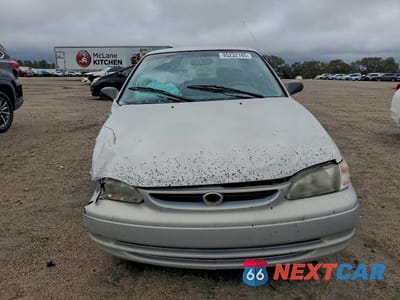 Piąte zdjęcie samochodu w środku: 2000 TOYOTA COROLLA VE VIN:1NXBR12E0YZ375948 - miniatura