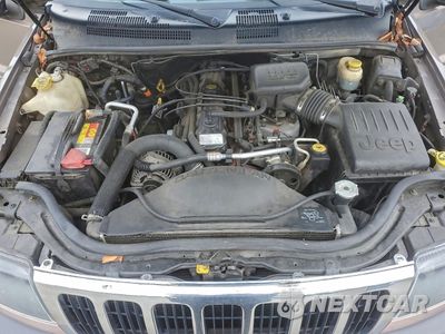 Zdjęcie 11 z 14 samochodu: 2001 JEEP GRAND CHEROKEE LAREDO VIN:1J4GW48S41C606308 - miniatura