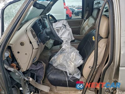 Zdjęcie 7 z 12 samochodu: 1999 CHEVROLET TAHOE K1500 VIN:1GNEK13R4XJ460340 - miniatura