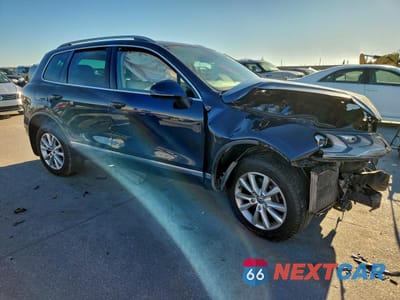 Czwarte zdjęcie samochodu z boku: 2014 VOLKSWAGEN TOUAREG V6 TDI VIN:WVGEP9BP3ED013868 - miniatura