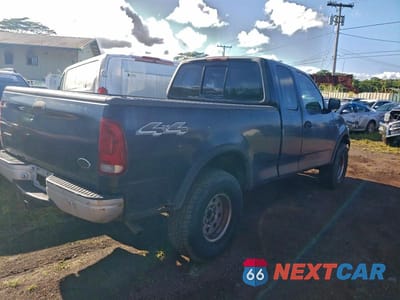 Trzecie zdjęcie samochodu z tyłu: 2000 FORD F150 VIN:1FTPX18LXYKA68515 - miniatura
