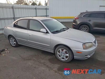 Czwarte zdjęcie samochodu z boku: 2006 HYUNDAI ELANTRA GLS VIN:KMHDN46D86U274516 - miniatura