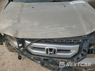 Zdjęcie 12 z 13 samochodu: 2010 HONDA PILOT EXL VIN:5FNYF4H5XAB011695 - miniatura
