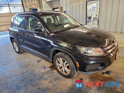 Czwarte zdjęcie samochodu z boku: 2017 VOLKSWAGEN TIGUAN S VIN:WVGBV7AX9HK024307 - miniatura