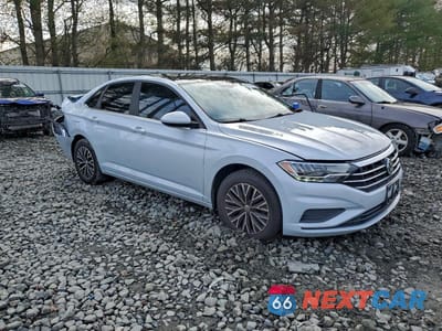 Czwarte zdjęcie samochodu z boku: 2019 VOLKSWAGEN JETTA S VIN:3VWC57BU3KM090779 - miniatura