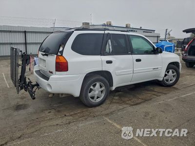 Trzecie zdjęcie samochodu z tyłu: 2002 GMC ENVOY VIN:1GKDS13S222331415 - miniatura