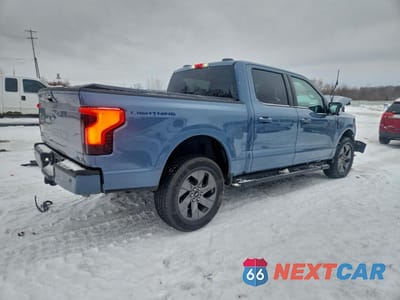Trzecie zdjęcie samochodu z tyłu: 2023 FORD F150 LIGHTNING PRO VIN:1FT6W1EV5PWG48184 - miniatura