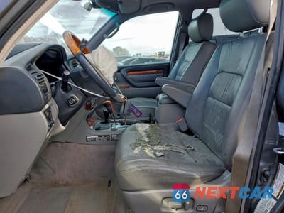 Zdjęcie 7 z 12 samochodu: 2004 LEXUS LX 470 VIN:JTJHT00W143543972 - miniatura