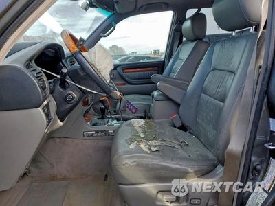 Zdjęcie 7 z 13 samochodu: 2004 LEXUS LX 470 VIN:JTJHT00W143543972 - miniatura