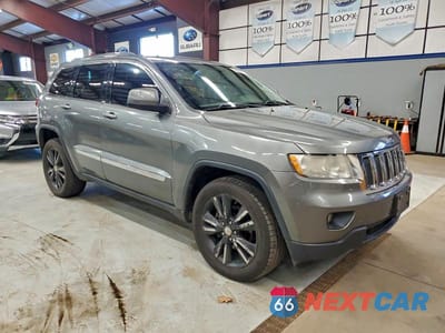 Czwarte zdjęcie samochodu z boku: 2012 JEEP GRAND CHEROKEE LAREDO VIN:1C4RJFAG8CC343323 - miniatura