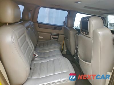 Zdjęcie 11 z 15 samochodu: 2003 HUMMER H2 VIN:5GRGN23U23H136418 - miniatura