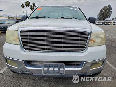 Piąte zdjęcie samochodu w środku: 2004 FORD F150 VIN:1FTPX12564KB48365 - miniatura