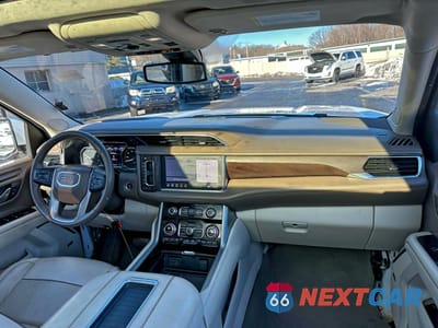 Zdjęcie 6 z 10 samochodu: 2021 GMC YUKON DENALI VIN:1GKS1DKT2MR375429 - miniatura