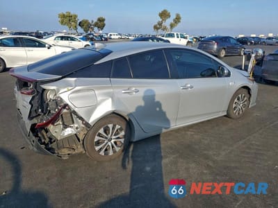 Trzecie zdjęcie samochodu z tyłu: 2021 TOYOTA PRIUS PRIME LE VIN:JTDKAMFP3M3178555 - miniatura