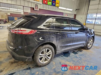 Trzecie zdjęcie samochodu z tyłu: 2020 FORD EDGE SEL VIN:2FMPK4J92LBB57685 - miniatura