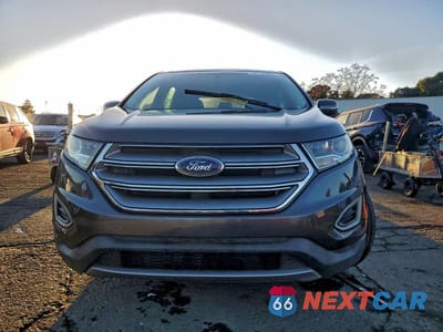 Piąte zdjęcie samochodu w środku: 2017 FORD EDGE TITANIUM VIN:2FMPK3K94HBB98741 - miniatura