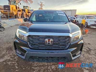 Piąte zdjęcie samochodu w środku: 2023 HONDA PASSPORT EXL VIN:5FNYF8H5XPB034054 - miniatura