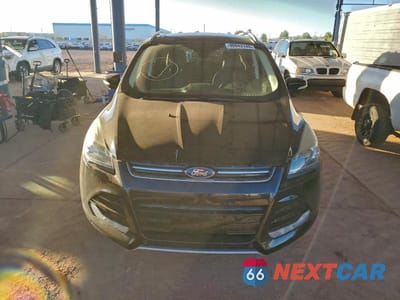 Piąte zdjęcie samochodu w środku: 2016 FORD ESCAPE TITANIUM VIN:1FMCU9JXXGUA65101 - miniatura