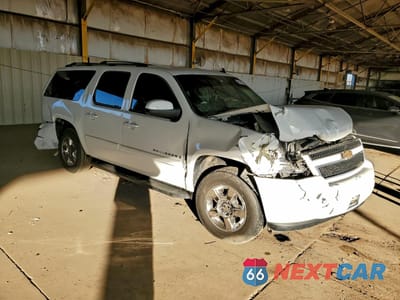 Czwarte zdjęcie samochodu z boku: 2007 CHEVROLET SUBURBAN C1500 VIN:1GNFC16J97J161689 - miniatura