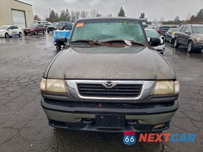 Piąte zdjęcie samochodu w środku: 1998 MAZDA B4000 CAB PLUS VIN:4F4ZR17X5WTM15836 - miniatura